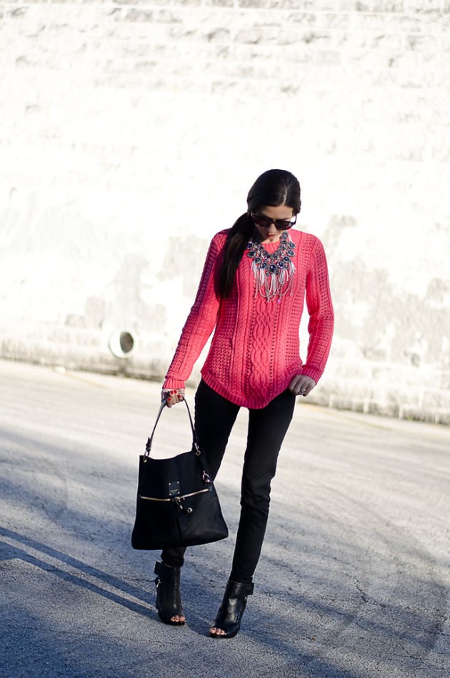 dressing-up-a-bright-pink-cable-knit-sweater-with-a-statement-necklace-1