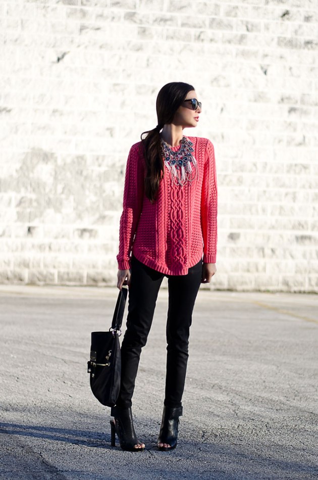 dressing-up-a-bright-pink-cable-knit-sweater-with-a-statement-necklace-5